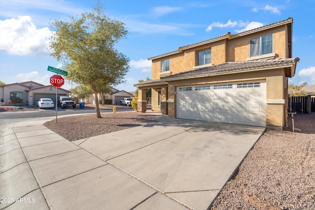 view of front of property with a garage