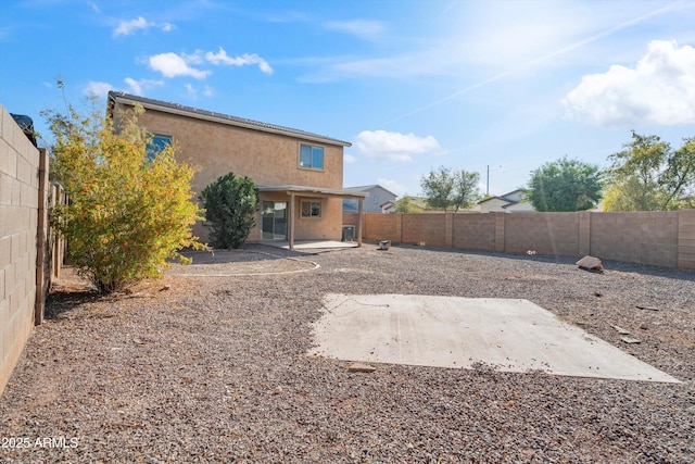 back of house featuring a patio area