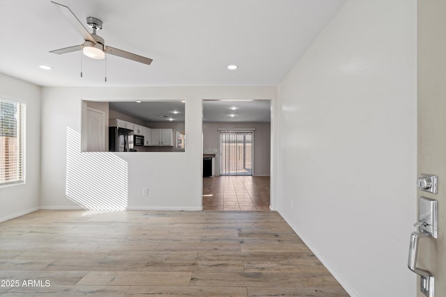 living room with ceiling fan