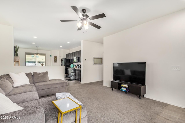 17573 W Via De Luna Dr, Surprise, AZ 85387 - carpeted living area featuring a ceiling fan and recessed lighting