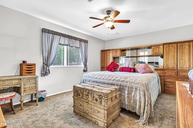 6055 E Hannibal St, Mesa, AZ 85205 - bedroom with carpet and ceiling fan