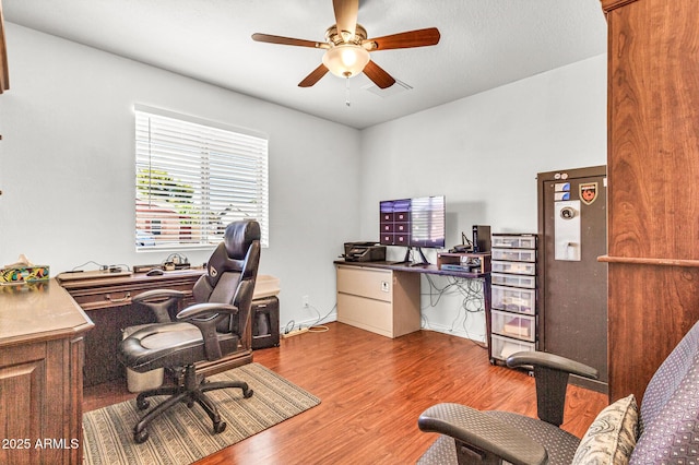 6055 E Hannibal St, Mesa, AZ 85205 - home office featuring wood finished floors and ceiling fan