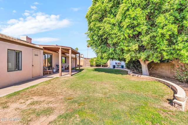 6055 E Hannibal St, Mesa, AZ 85205 - fenced backyard featuring a patio