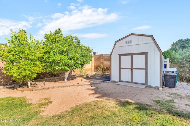 6055 E Hannibal St, Mesa, AZ 85205 - view of shed with a garden and a fenced backyard