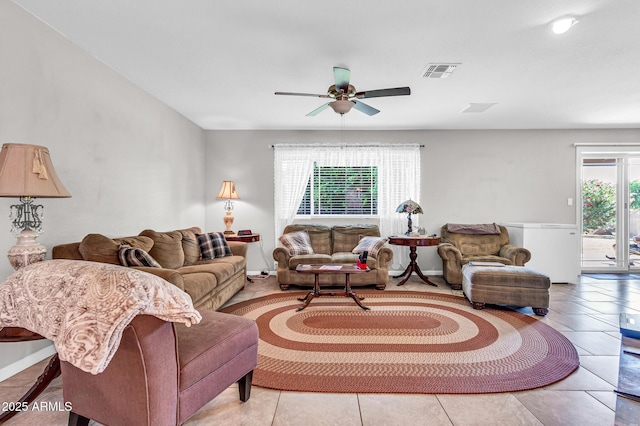 6055 E Hannibal St, Mesa, AZ 85205 - living area featuring ceiling fan and tile patterned floors