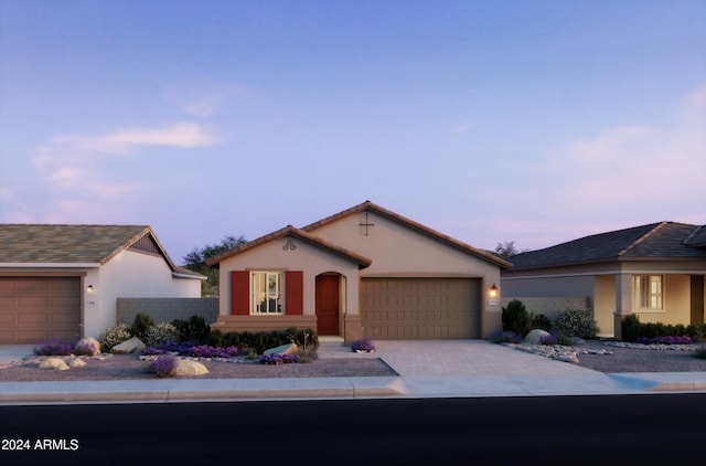 view of front of property with a garage