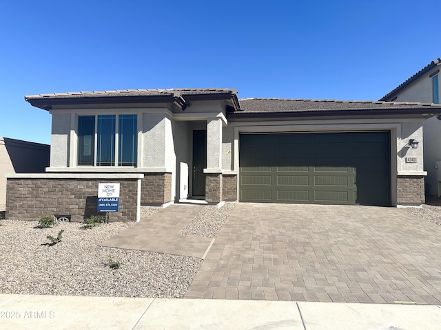 prairie-style house with a garage