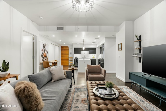 living room featuring dark wood-type flooring