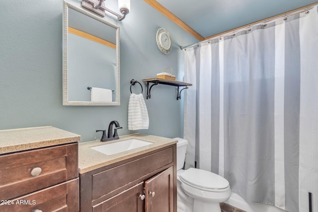 bathroom with a shower with curtain, vanity, and toilet