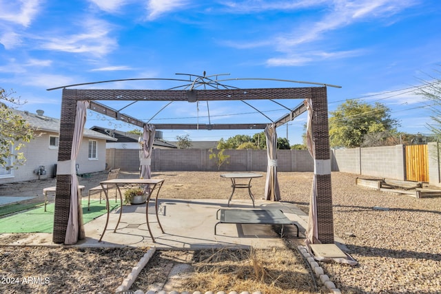 exterior space featuring a gazebo and a patio area