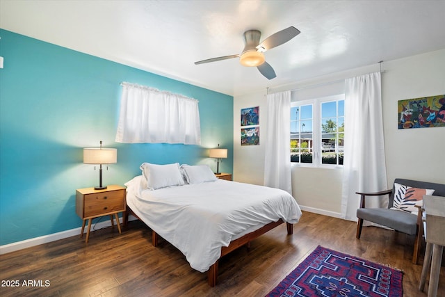 1939 E Solano Dr, Phoenix, AZ 85016 - bedroom featuring baseboards, wood finished floors, and ceiling fan