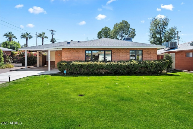 1939 E Solano Dr, Phoenix, AZ 85016 - single story home with driveway, a carport, and a front yard