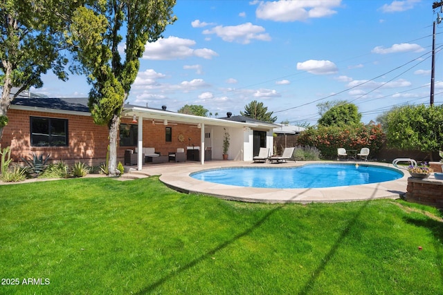 1939 E Solano Dr, Phoenix, AZ 85016 - view of pool featuring outdoor lounge area, a fenced in pool, a yard, and a patio area