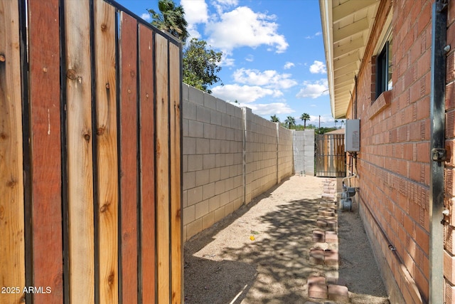 1939 E Solano Dr, Phoenix, AZ 85016 - view of side of property with a gate and fence