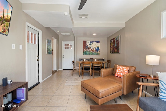 1939 E Solano Dr, Phoenix, AZ 85016 - foyer featuring light tile patterned floors, baseboards, and visible vents