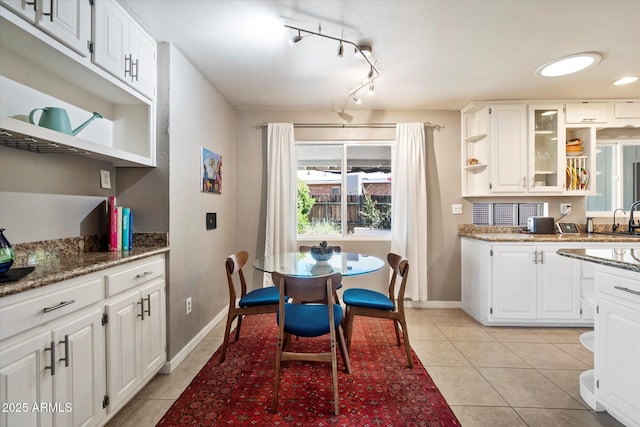1939 E Solano Dr, Phoenix, AZ 85016 - kitchen featuring white cabinets, light tile patterned flooring, and open shelves