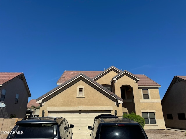 front facade with a garage