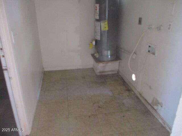 utility room with water heater