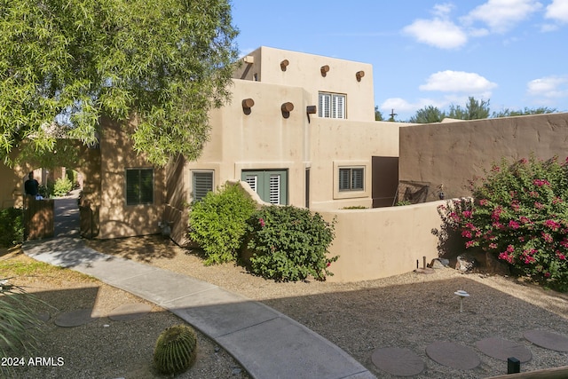 38065 N Cave Creek Rd Unit 4, Cave Creek, AZ 85331 - exterior space featuring stucco siding and fence