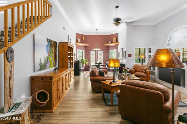 38065 N Cave Creek Rd Unit 4, Cave Creek, AZ 85331 - living room with light wood finished floors, a high ceiling, crown molding, and a ceiling fan
