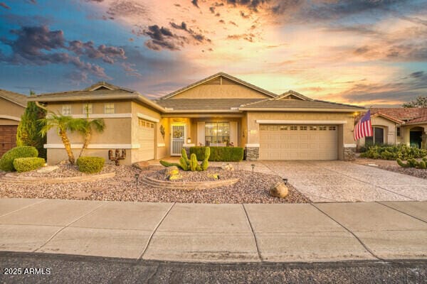 view of front of home with a garage