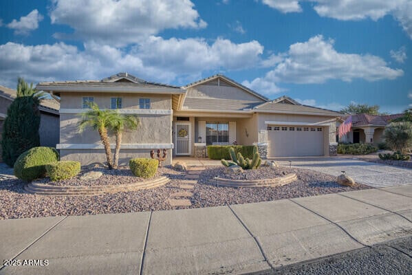 view of front of property featuring a garage