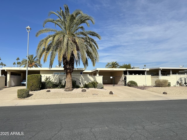 view of front of house with a carport