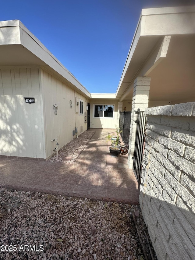 view of home's exterior featuring a patio area