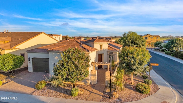 view of front of property featuring a garage