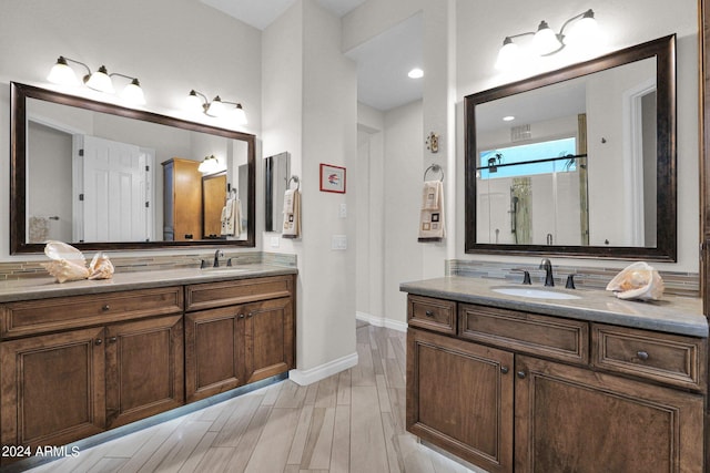 bathroom featuring vanity and walk in shower