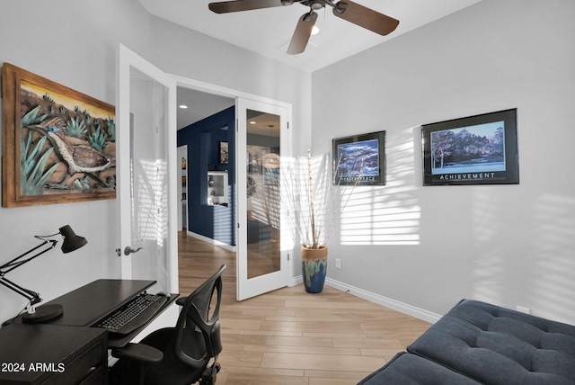 office area with ceiling fan, wood-type flooring, and french doors