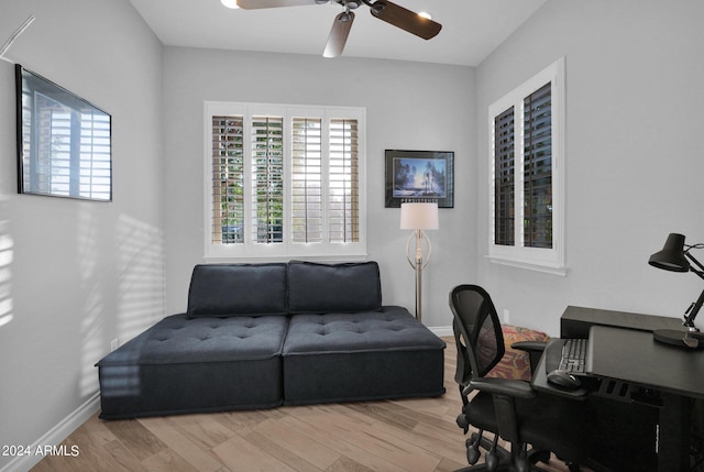 office area featuring ceiling fan and light wood-type flooring