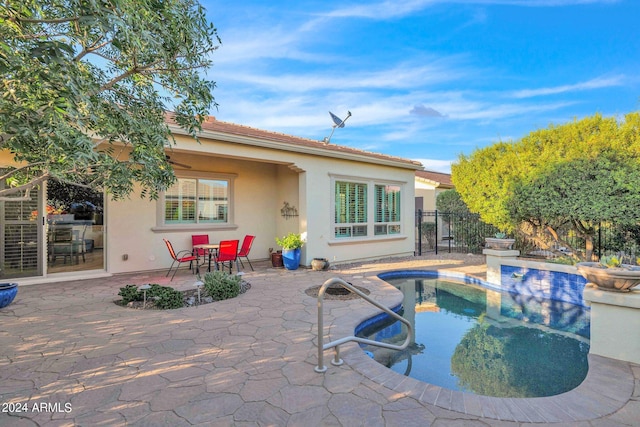 view of swimming pool with a patio area