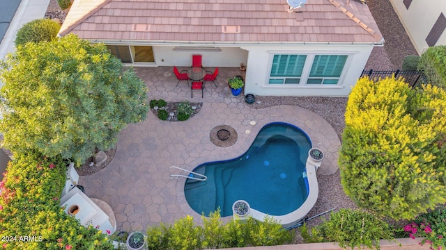 view of pool with a patio