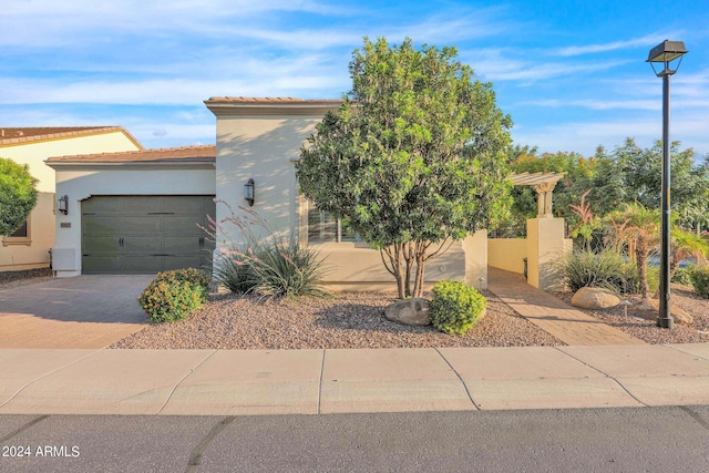 view of front of property with a garage