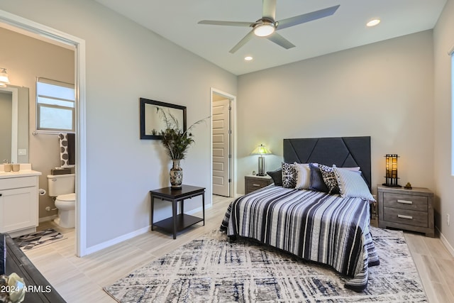 bedroom featuring ensuite bathroom and ceiling fan