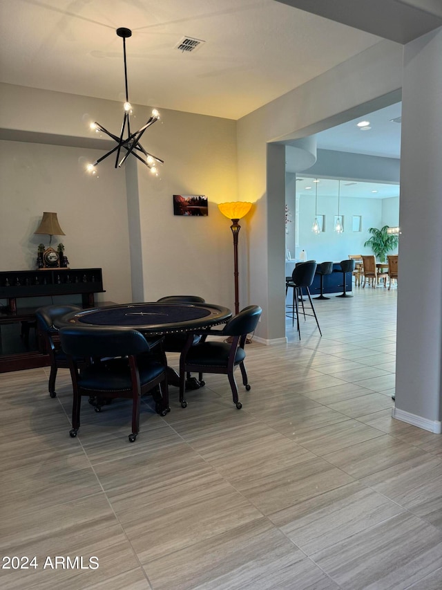 dining area featuring a chandelier