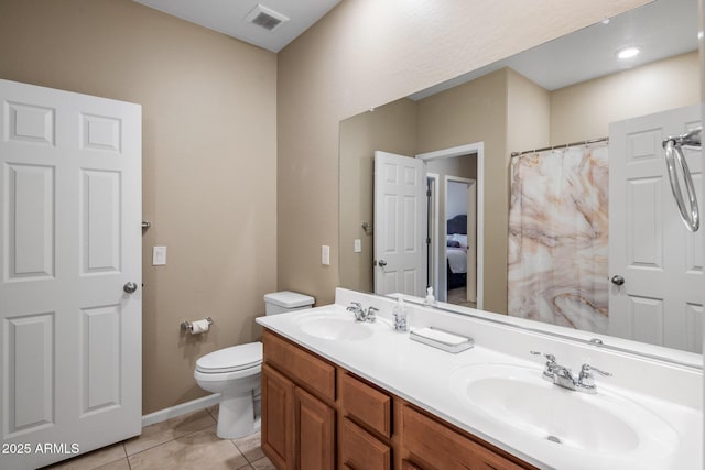 4230 W Palace Station Rd, New River, AZ 85087 - full bath featuring double vanity, tile patterned floors, and a shower with shower curtain