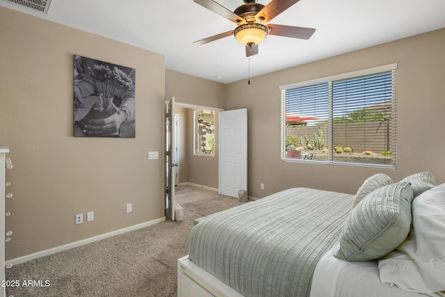 4230 W Palace Station Rd, New River, AZ 85087 - bedroom featuring light colored carpet and ceiling fan