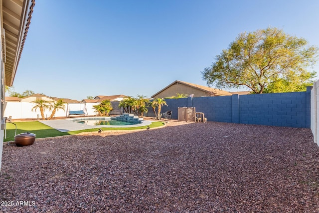 view of yard featuring a fenced in pool, a patio area, and a fenced backyard