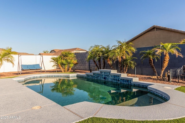 view of swimming pool with a fenced in pool, a patio, and a fenced backyard