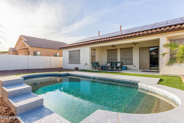view of pool featuring a fenced in pool, a patio area, fence, and a ceiling fan