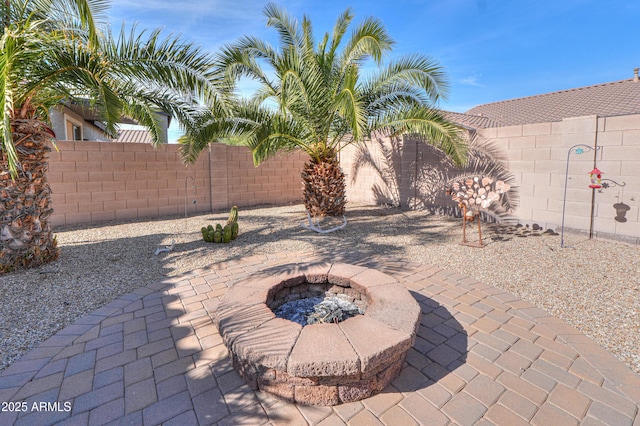 view of patio featuring a fire pit