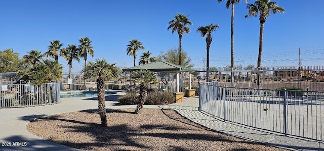 view of yard with a community pool