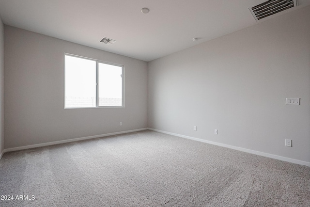 empty room featuring carpet floors