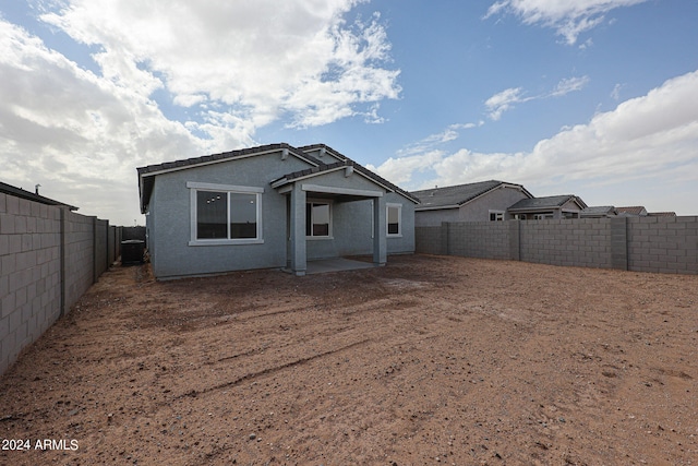 back of property featuring a patio area