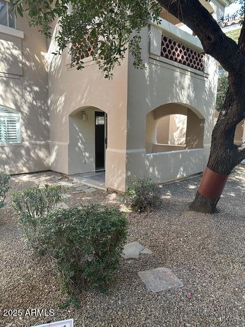 exterior space with stucco siding