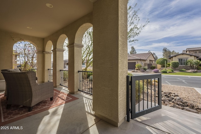 view of patio with a residential view