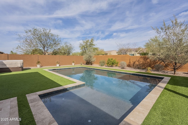 view of pool featuring a fenced backyard, a fenced in pool, a jacuzzi, and a lawn