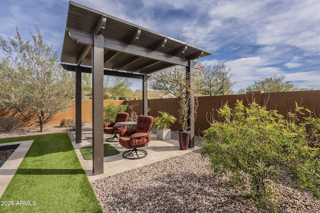 view of patio featuring a fenced backyard and a pergola